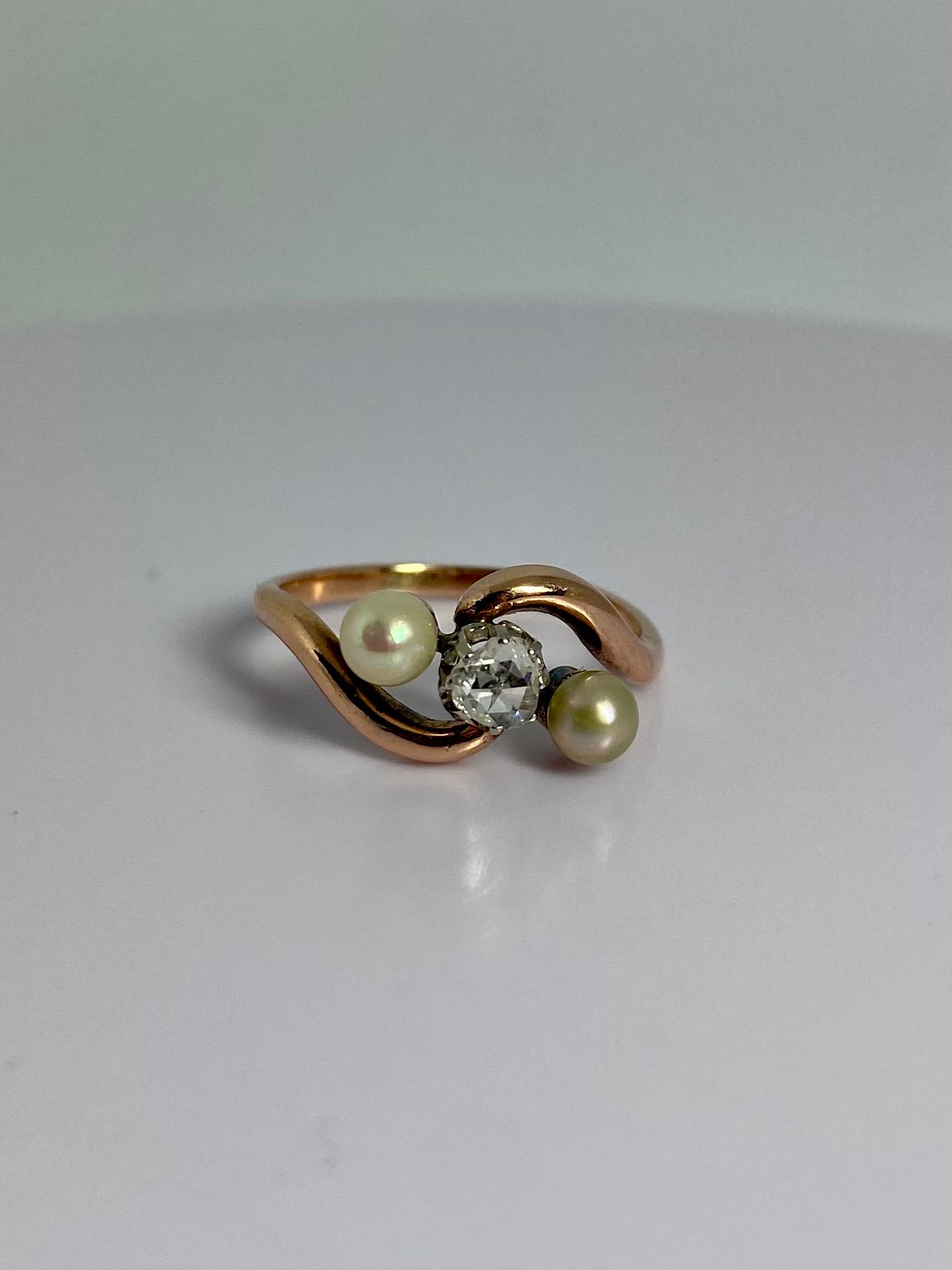 Antique crossover ring with pearls and diamond