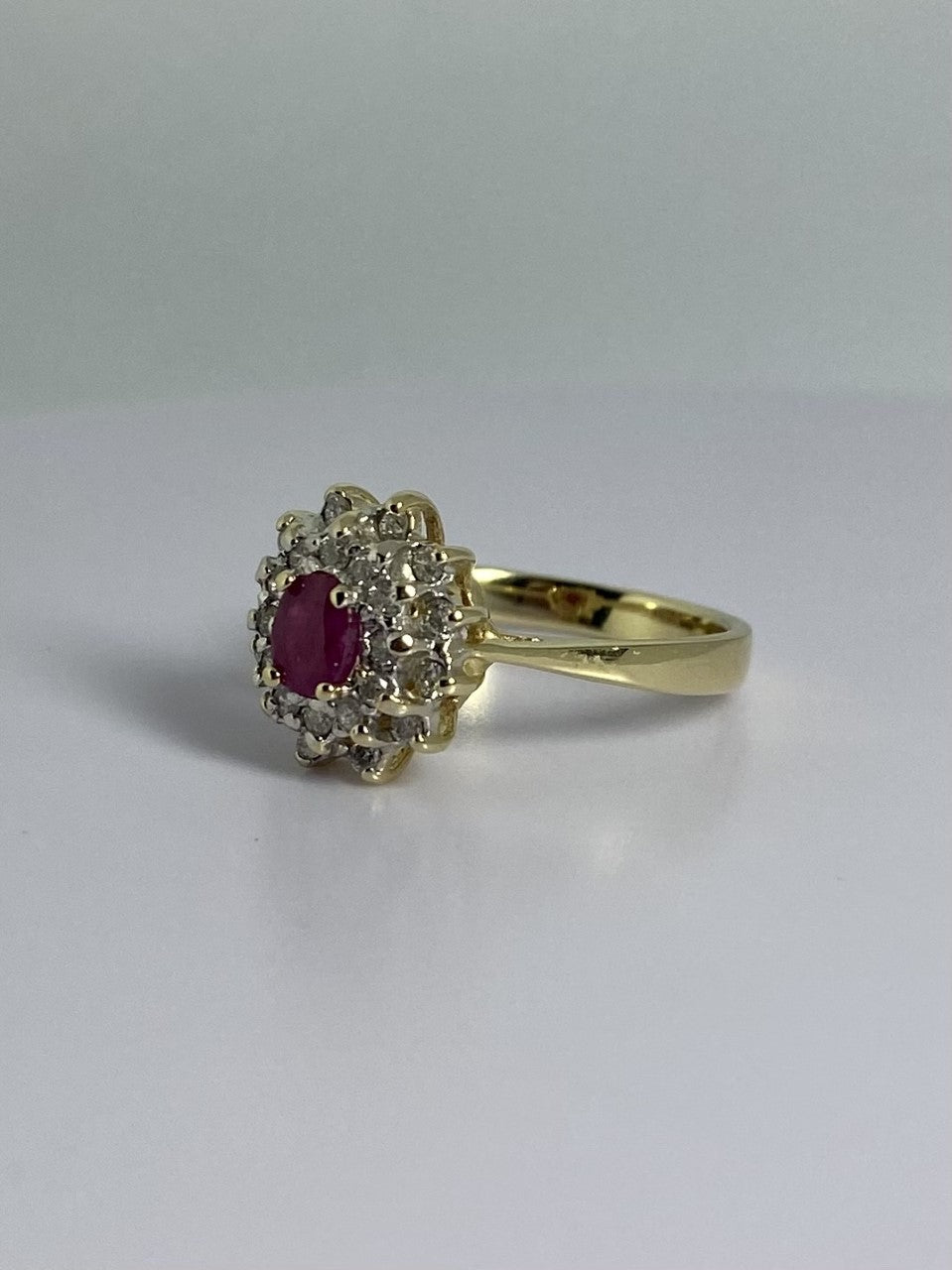 Entourage ring with ruby & brilliants front left view