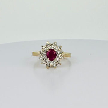Vintage entourage ring with oval ruby & diamonds