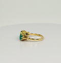 Ring with natural diamonds and emeralds on site