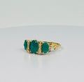 Ring with natural diamonds and emeralds