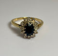 Ring with blue sapphire & diamonds