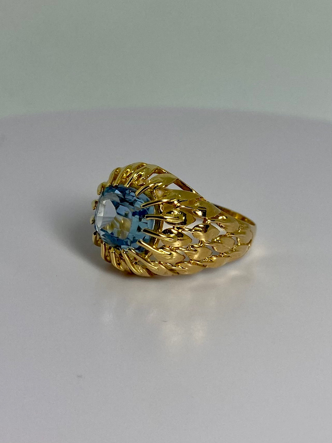 Ring with blue spinel front