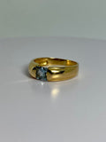 Vintage ring with topaz left front