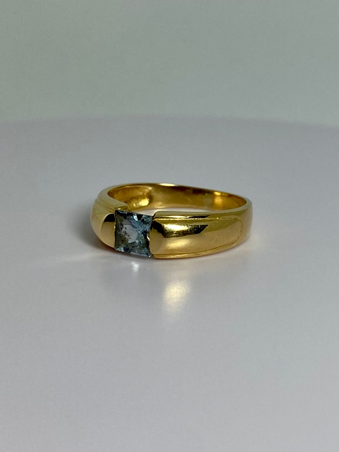 Vintage ring with topaz left front